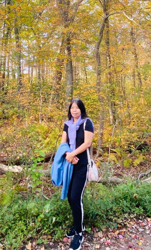 A person standing in a forest
AI-generated content may be incorrect.